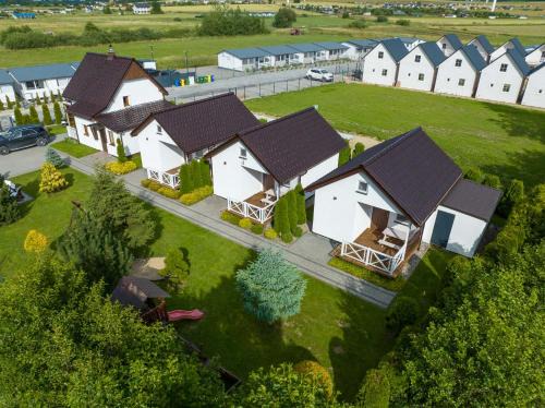 Darlowo House | Cozy Białe Żagle: Oceanfront Family-Friendly Retreat