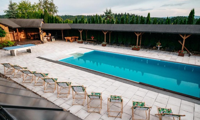 Lesko Ski Chalet | Experience Bieszczadzka Bania: Oceanfront Retreat with Pool