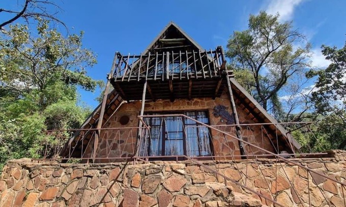 Buffelspoort Ski Chalet | Guest Rated Bietjie Bos Chalet with Oceanfront Pool Access