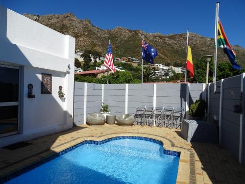 Gordons Bay Central House | Big Skies Guesthouse: Oceanfront Retreat with Pool