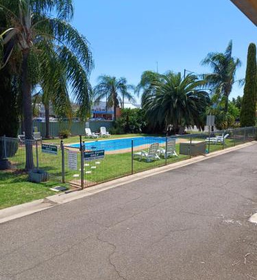Gunnedah Hotel | Cozy Billabong Motel: Oceanfront Escape with Pool Access