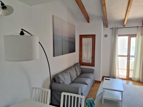 Arenal d'en Castell Apartment | Coastal Haven: Biniplaya Apartment by the Beach
