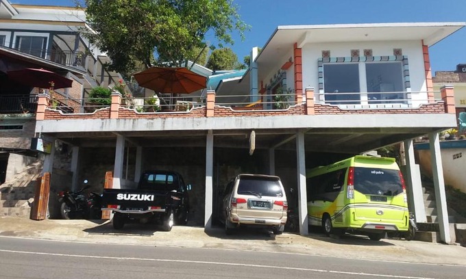 Moni House | Discover Bintang Bungalow: Oceanfront with Pool & Breakfast