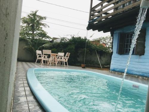 Vila Nova House | Relax at Biocasa: Poolside Retreat Steps from the Beach