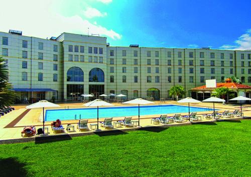 Malabo Hotel | Relax at Bisila Palace: Oceanfront Escape with Pool & Spa