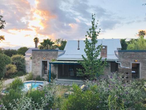 Riebeek Kasteel Ski Chalet | Relax at Blaauw Cottage: Oceanfront Retreat with Pool