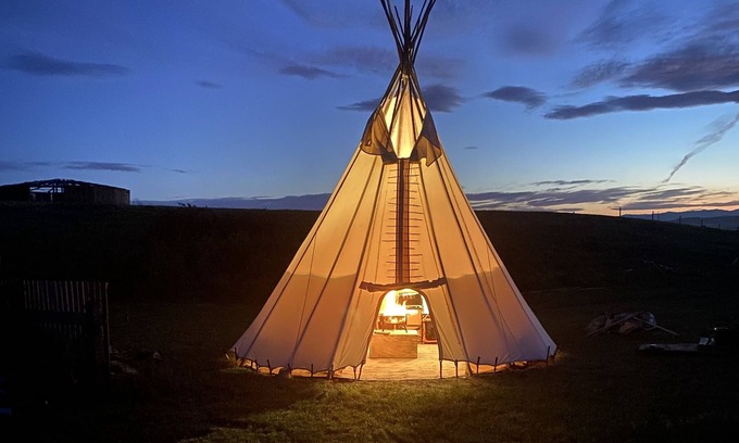 Division No. 3 House | Enchanting Blackfoot Tipi Lodging Beneath the Prairie Sky
