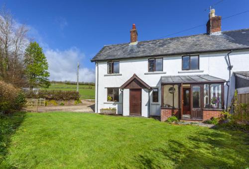 Wheddon Cross House | Pet-Friendly Blagdon Cottage in Picturesque Wheddon Cross