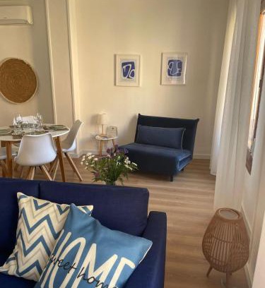 Valdepenas Apartment | Discover Blanco y Añil Plaza: Family-Friendly Getaway