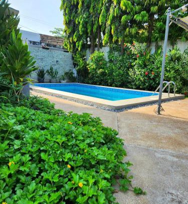 Lome House | Tranquil Getaway in Oceanfront Garden with Pool