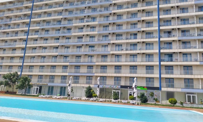 Neptun Apartment | Blaxy Resort STEFI: Family-Friendly Beachfront Retreat