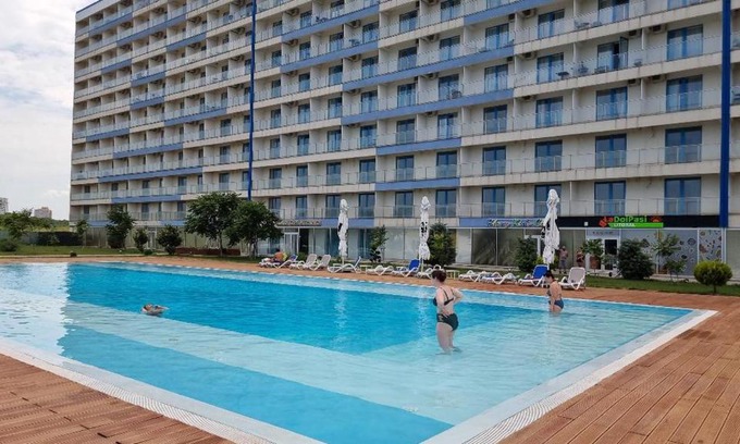 Neptun Apartment | Family-Friendly Getaway at Blaxy Resort with Pool Access