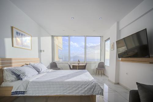 Loutraki-Agioi Theodoroi Apartment | Experience Ble Property Atlas: Beachfront Bliss Awaits