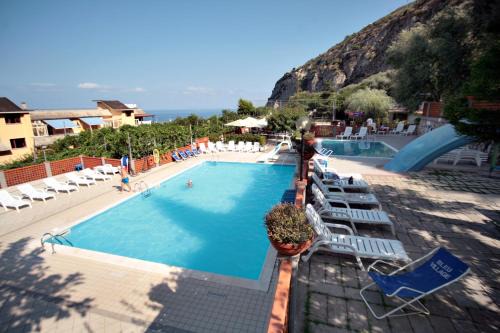 Meta Resort | Beautiful Bleu Village: Oceanfront Retreat with Hot Tub