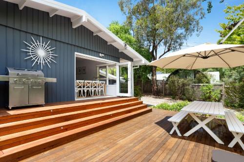 Shoreham House | Cozy Blue Beachside Retreat: Pet-Friendly Comfort Awaits