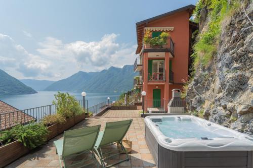 Colonno Apartment | Oceanfront Blue Bliss Apartment with Hot Tub & Views
