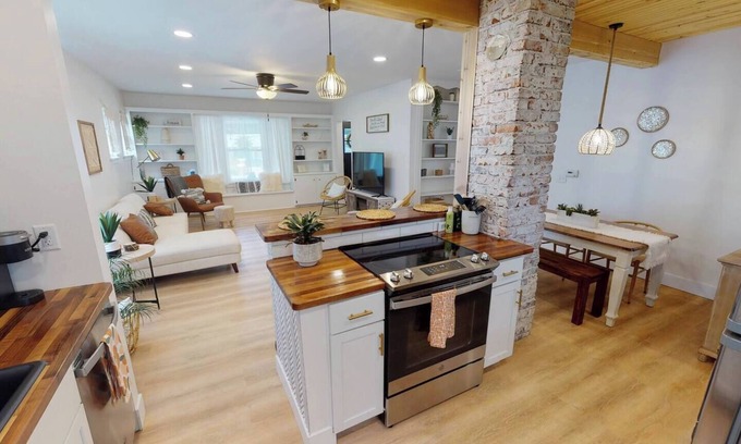 Wichita House | Bright Blue Bungalow: Rated 10/10 with Spa & Family Amenities