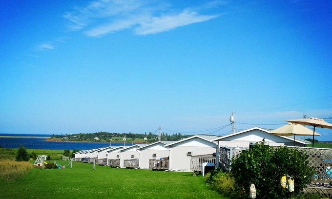 Rusticoville Resort | Relax at Blue Crest Cottages with Ocean View & Private Beach
