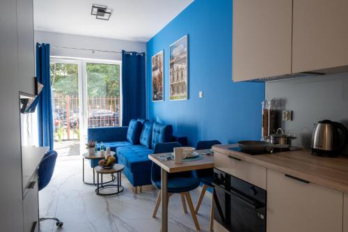 Srodmiescie Apartment | Blue Garden Studio by Fengshui4u
