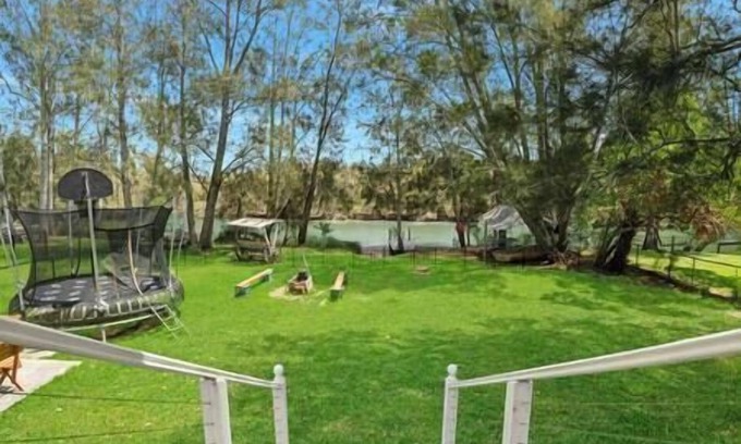 Charmhaven House | Discover a Unique Waterfront Holiday House with Vintage Caravans