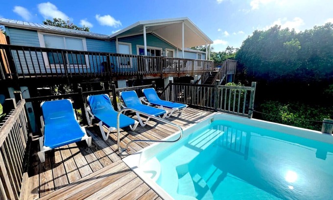 Cudjoe Key House | Beautiful Blue Vacation Home with Private Heated Pool