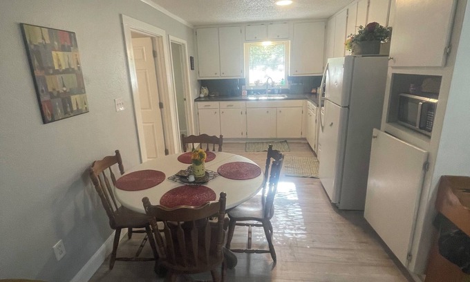 Lone Oak House | Family-Friendly Blue Pool House with Pet Amenities