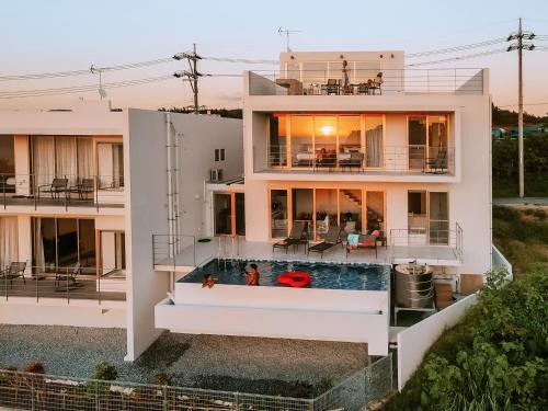 Maeganeku Villa | Top-Rated Blue Rela Luxe Resort Okinawa with Pool & Hot Tub