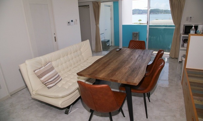 Uruma Apartment | Discover Blue Room in Uruma, Okinawa - Pet Friendly Stay