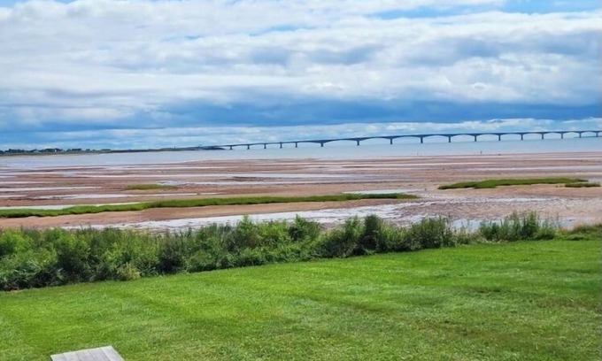 Borden-Carleton Cottage | Inviting Blue Suede View Cottage with Oceanfront Serenity