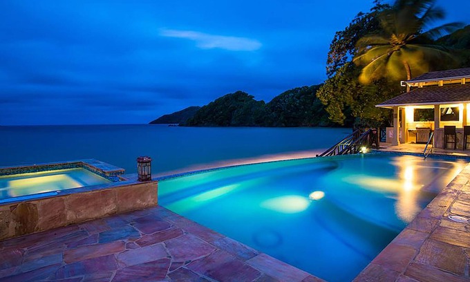 Speyside Hotel | Blue Waters Inn: Relax by the Pool with Ocean Views