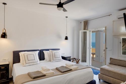 Syros House | Indulge in the Blueros Black Stone Suite with Hot Tub