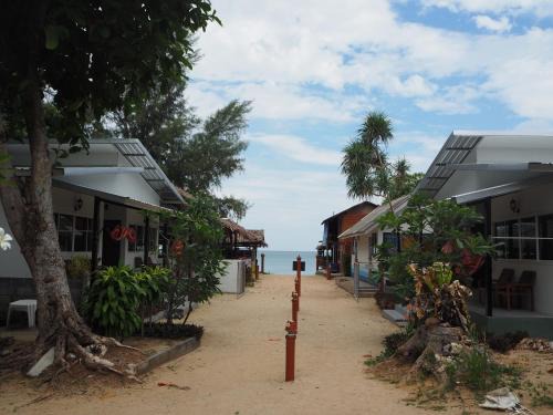 Ko Lanta House | Oceanfront Bliss at Bluesky Beach Bungalows - Rated 9.2/10