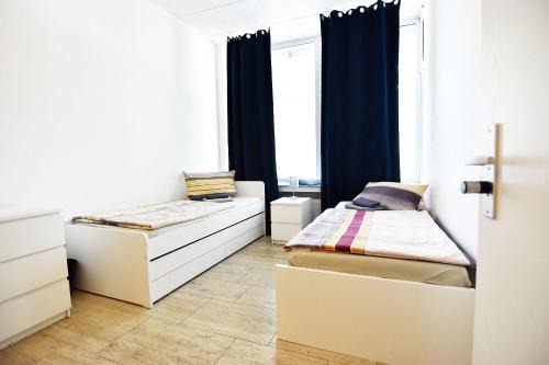 Mauenheim Apartment | Cozy Boardinghouse in Cologne with Free WiFi & Family-Friendly