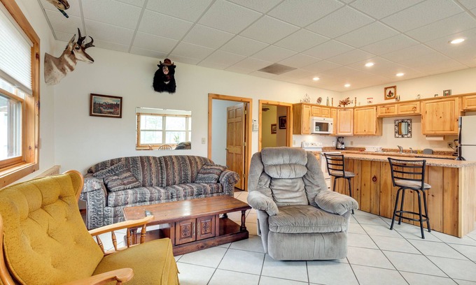 Rhinelander Cottage | Inviting Monico Lakefront Home with Boat Dock & Fire Pit