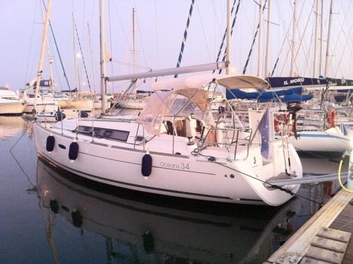 Sardinia Boat Rental | Unwind at Torregrande Sinis Yachting with Oceanfront Views