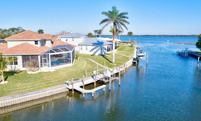 Palma Sola House | Bayfront Oasis with Heated Pool and Boat Dock Awaits You!