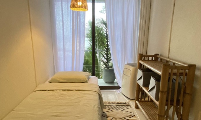 Chaloklum Ski Chalet | Pet-Friendly Boho Beachfront Cottage for Family Getaways