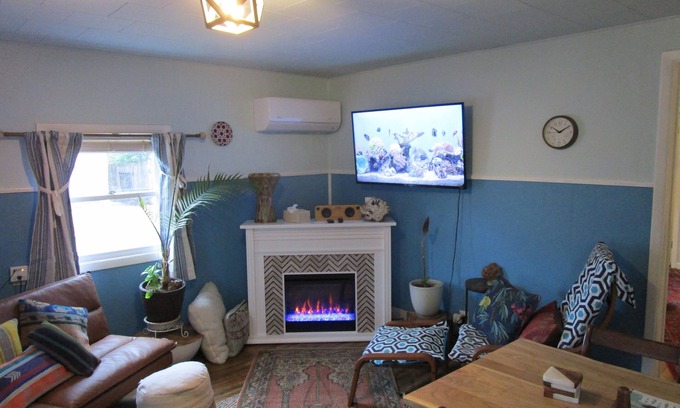 Bloomington Apartment | Cozy Boho-Chic Retreat with Fireplace & Spa Amenities