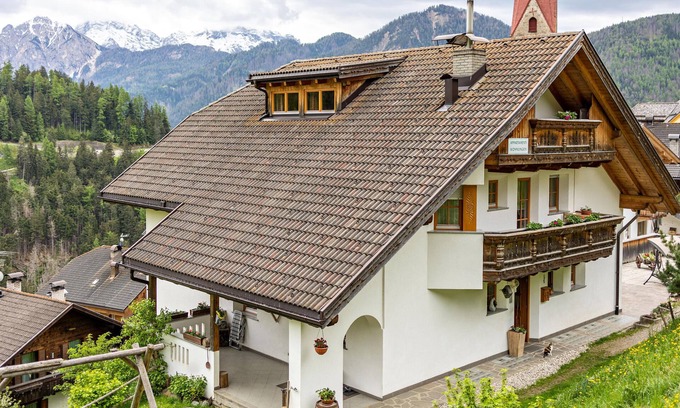 Mareo Apartment | Bolser Apartment Piz da Peres: Scenic Mountain Views & Garden