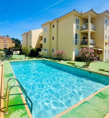 Puerto de Pollensa Apartment | Inviting Apartment with Pool Steps from the Beach