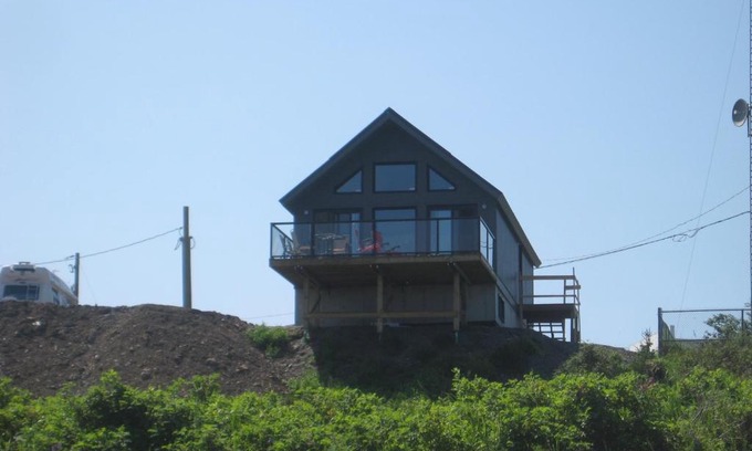 Sainte-Felicite House | Pet-Friendly Oceanfront Retreat with Cathedral Views