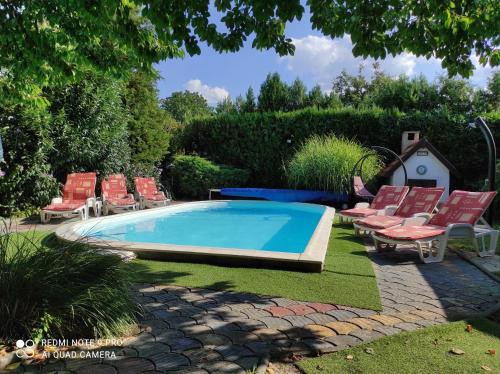 Balatonboglar House | Experience Borostyán Nyaralóház: 4-Star Poolside Retreat