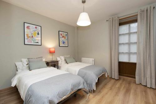 El Pueyo de Jaca Apartment | Family-Friendly Getaway at Bosque del Sapo by BeValle