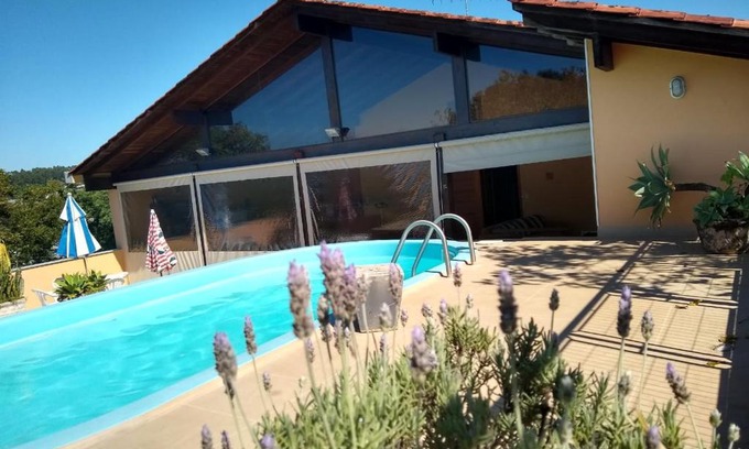 Bom Principio Apartment | Exclusive Bosque Urbano: Cozy Retreat with Pool & Ocean Views