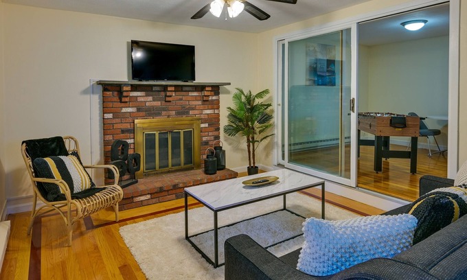 Fairmount Hill Apartment | Modern Boston Duplex with Foosball Table Near Downtown