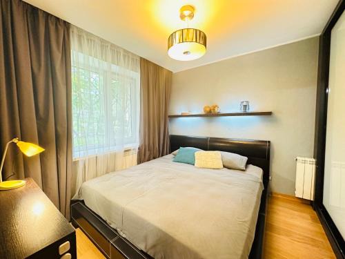 Dzerzhyns'kyi District Apartment | Cozy Botanical Garden Apartment with Breakfast & Pet Friendly