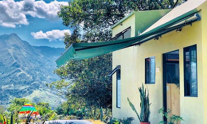 Copacabana House | Botanico Glamping: Ocean View Mobile Home with Spa Amenities