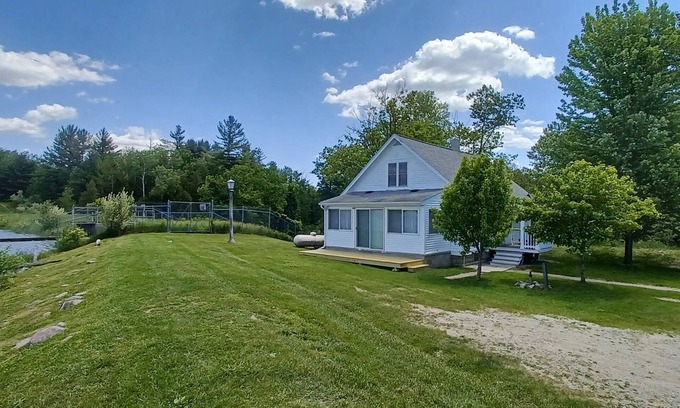 West Branch Cottage | Perfect Retreat: Lake & River Frontage with Great Fishing!