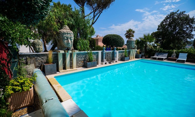 Saint-Aygulf Villa | Gorgeous Buddha House Villa with Heated Pool & Ocean Views