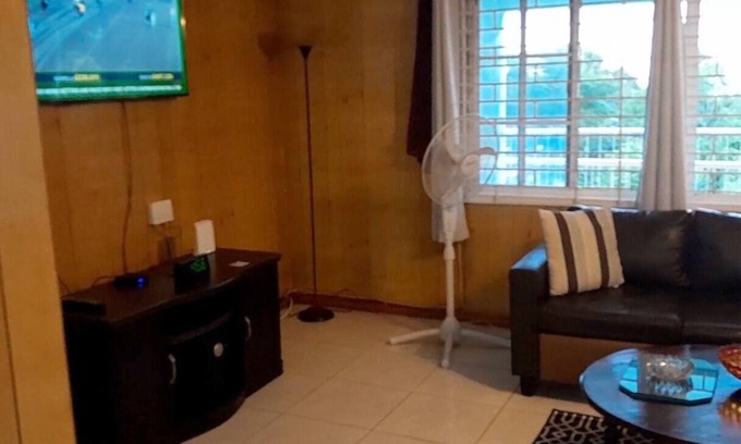 Saint Andrew House | Exquisite Bougainvillea Palms: Pet-Friendly Family Retreat